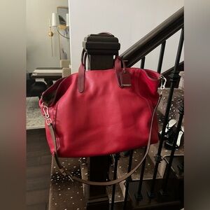 Like new Cole Haan red title bag with strap